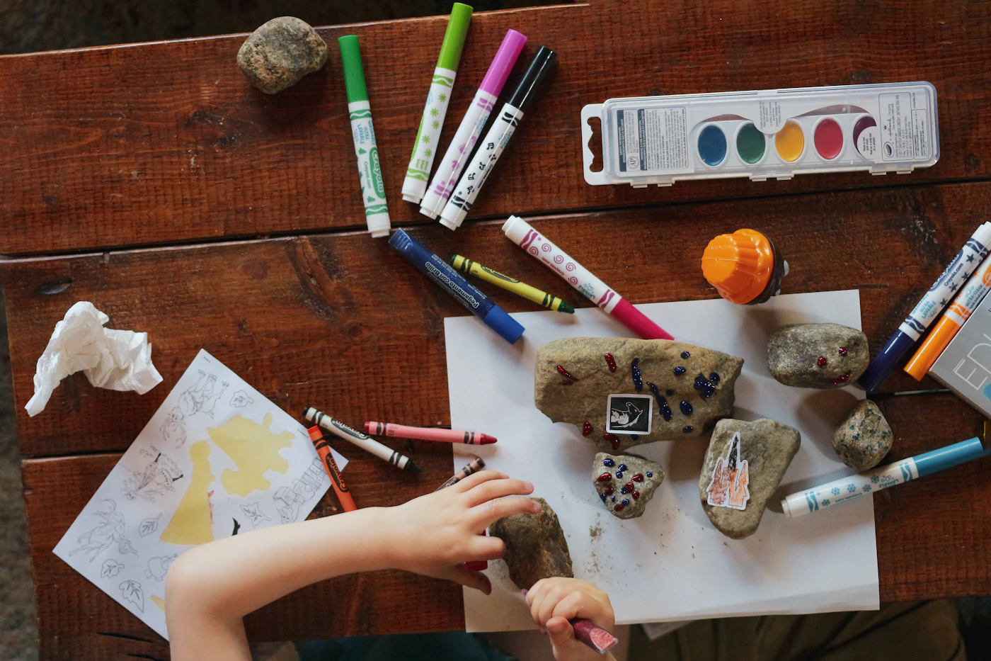 Child absorbed in a creative art activity